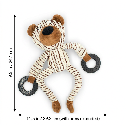 A plush monkey toy with brown and cream striped fabric, a brown face and feet, and two black textured ring handles, shown on a white background with dimension arrows and text indicating 11.5 in width and 9.