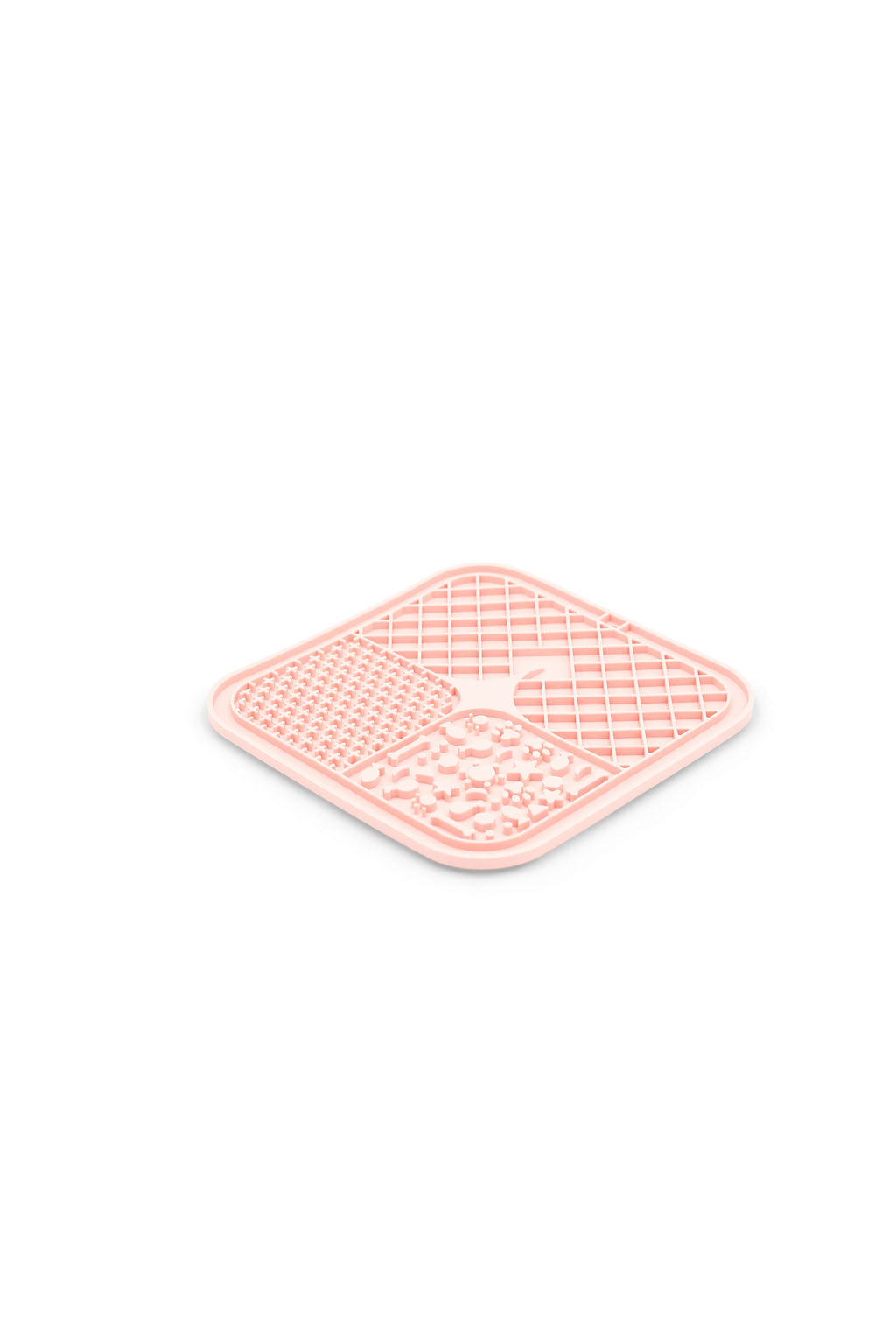 A square pink silicone trivet with a textured grid pattern and a central cutout, shown on a plain white background.