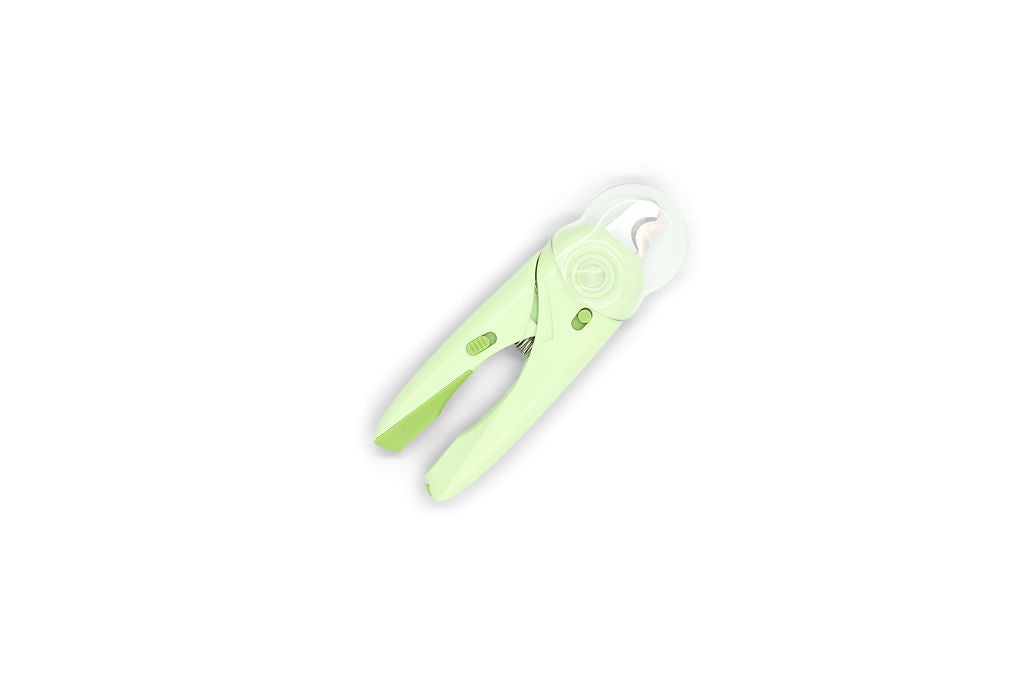 Close-up view of the stainless steel trimming blade and LED light source on the BudgetPaws Nail Clippers.