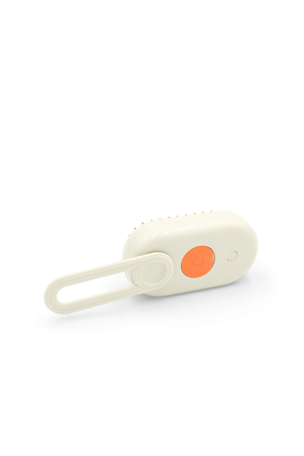 A cream-colored personal massager with a loop handle and a contrasting orange circular button, shown on a plain white background.