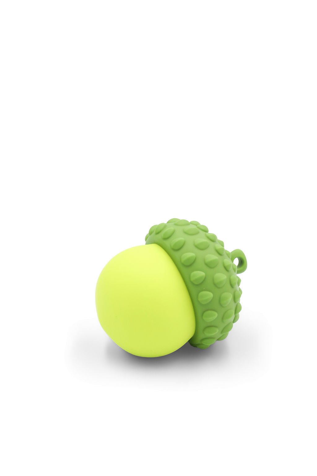 Close-up view of the treat dispensing opening on the BudgetPaws Acorn cat toy in Budget Green.
